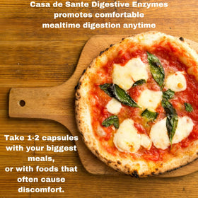 Casa de Sante Enzymes daily, capsules sur une table en bois