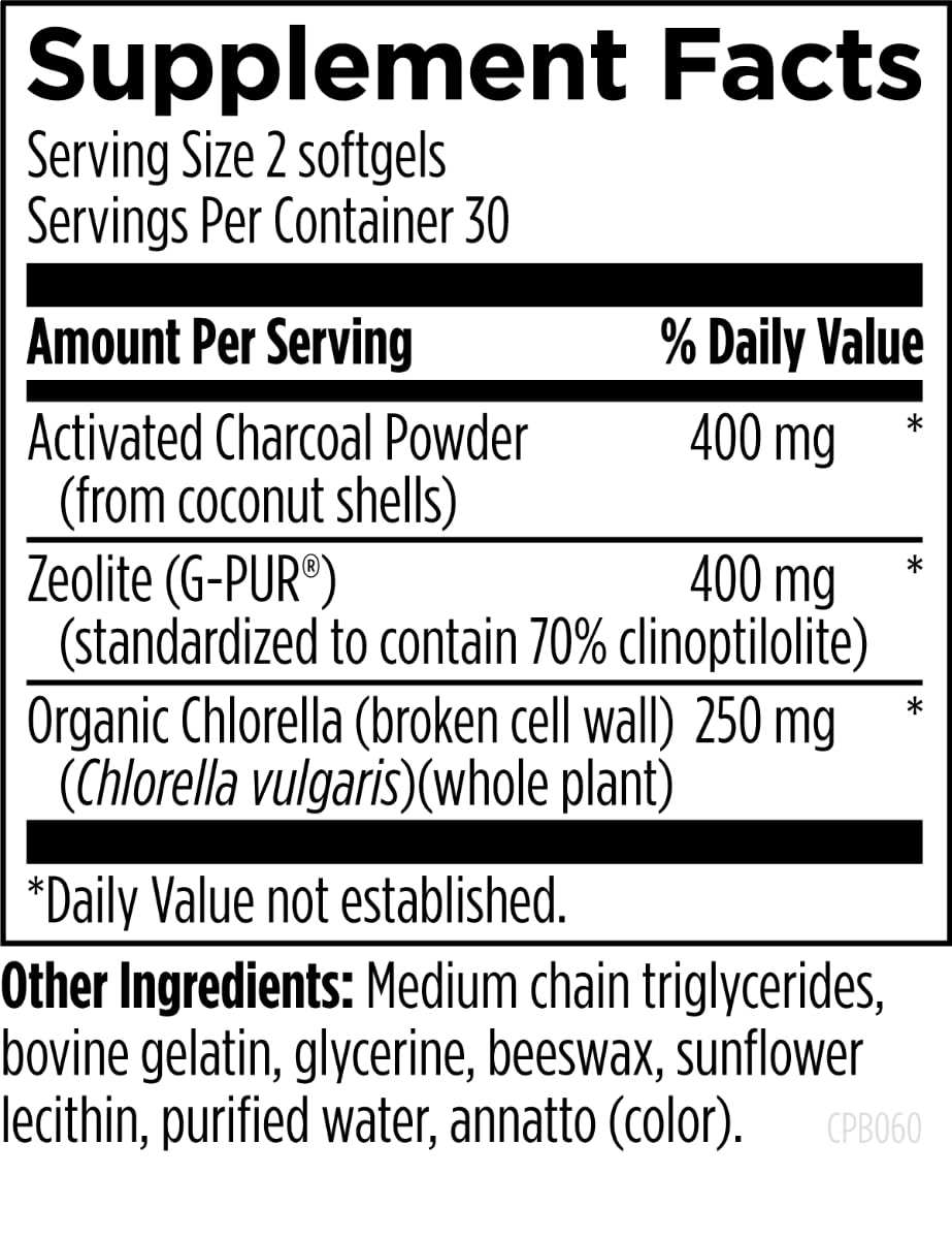 Charcoal Plus Binder Designs for Health avec des gélules sur une table