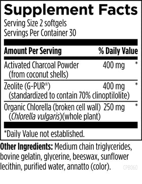 Charcoal Plus Binder Designs for Health avec des gélules sur une table