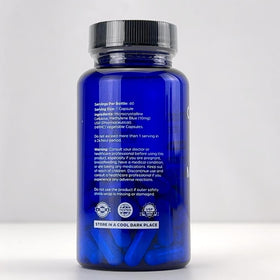 Chemist Labs Methylene Blue capsules with a glass of water