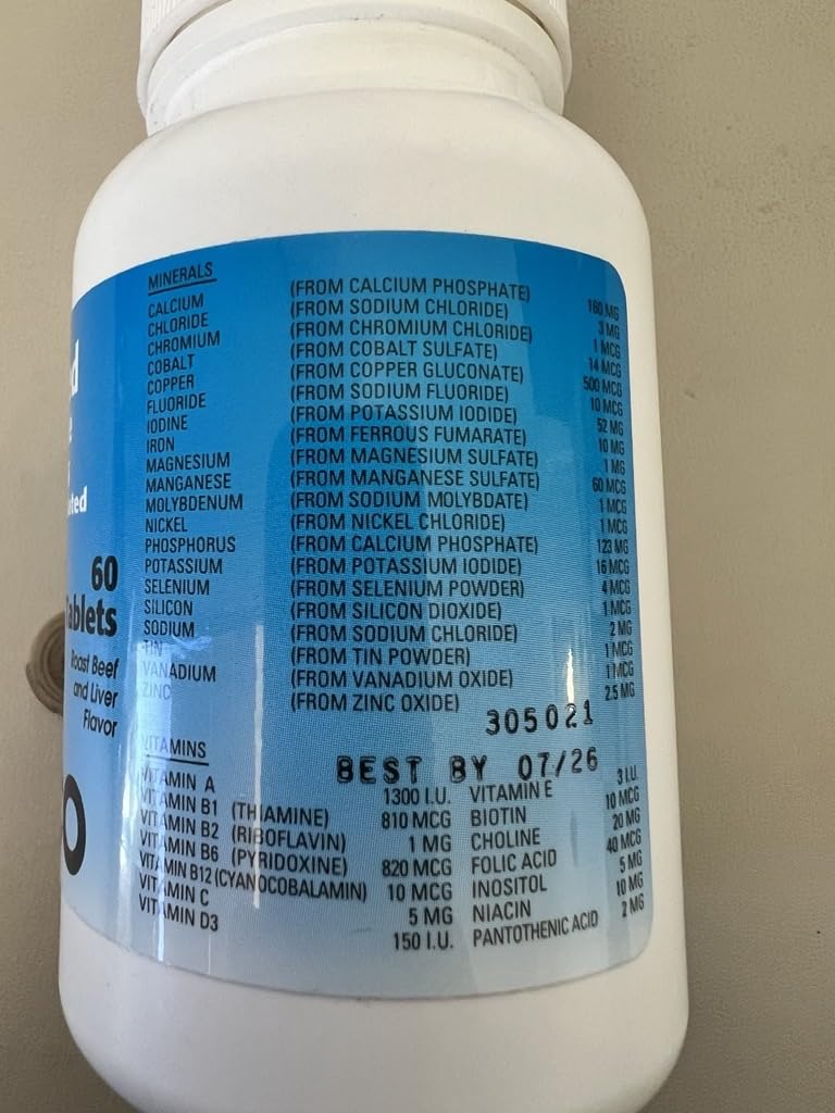 Chiot prenant un comprimé à croquer Vedco Calcium Plus