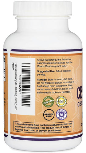 Cissus Quadrangularis capsules sur une surface en bois