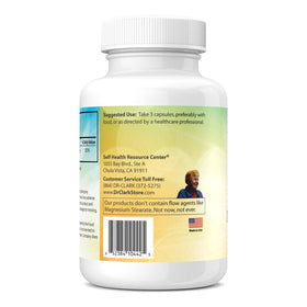 Citrate de Magnésium Dr Clark Store sur une table avec un verre d'eau