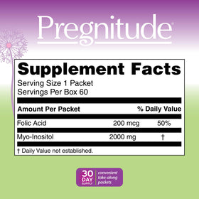 Close-up sur un sachet de Pregnitude dans un verre d'eau