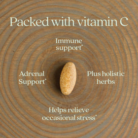 Complément alimentaire Vitamine C New Chapter sur un fond blanc