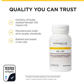 Complément K2 + D3 d'Integrative Therapeutics présenté avec des légumes frais
