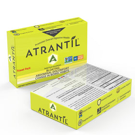 Comprimés Atrantil sur une surface blanche