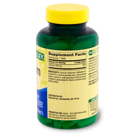 Comprimés de calcium 600mg disposés sur une table
