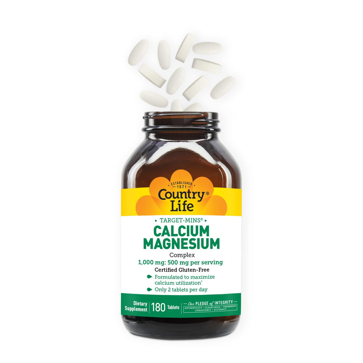 Comprimés de Calcium Magnésium Country Life avec un verre d'eau