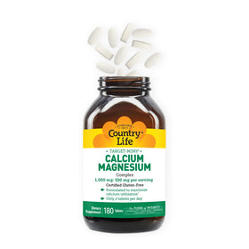 Comprimés de Calcium Magnésium Country Life avec un verre d'eau