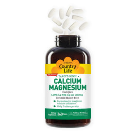 Comprimés de Calcium Magnésium Country Life dans une main