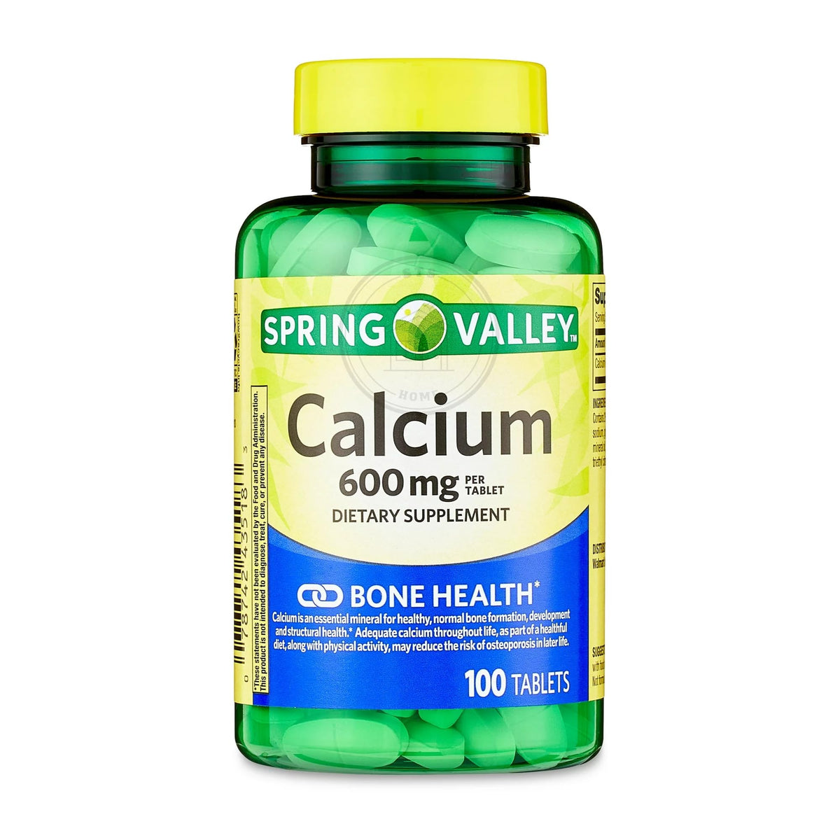 Comprimés de calcium STS Home sur une surface blanche