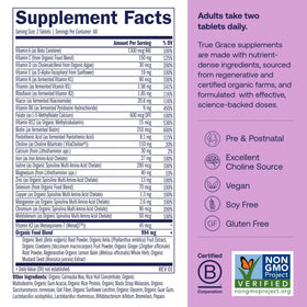 Comprimés de multivitamine prénatale True Grace sur un fond blanc