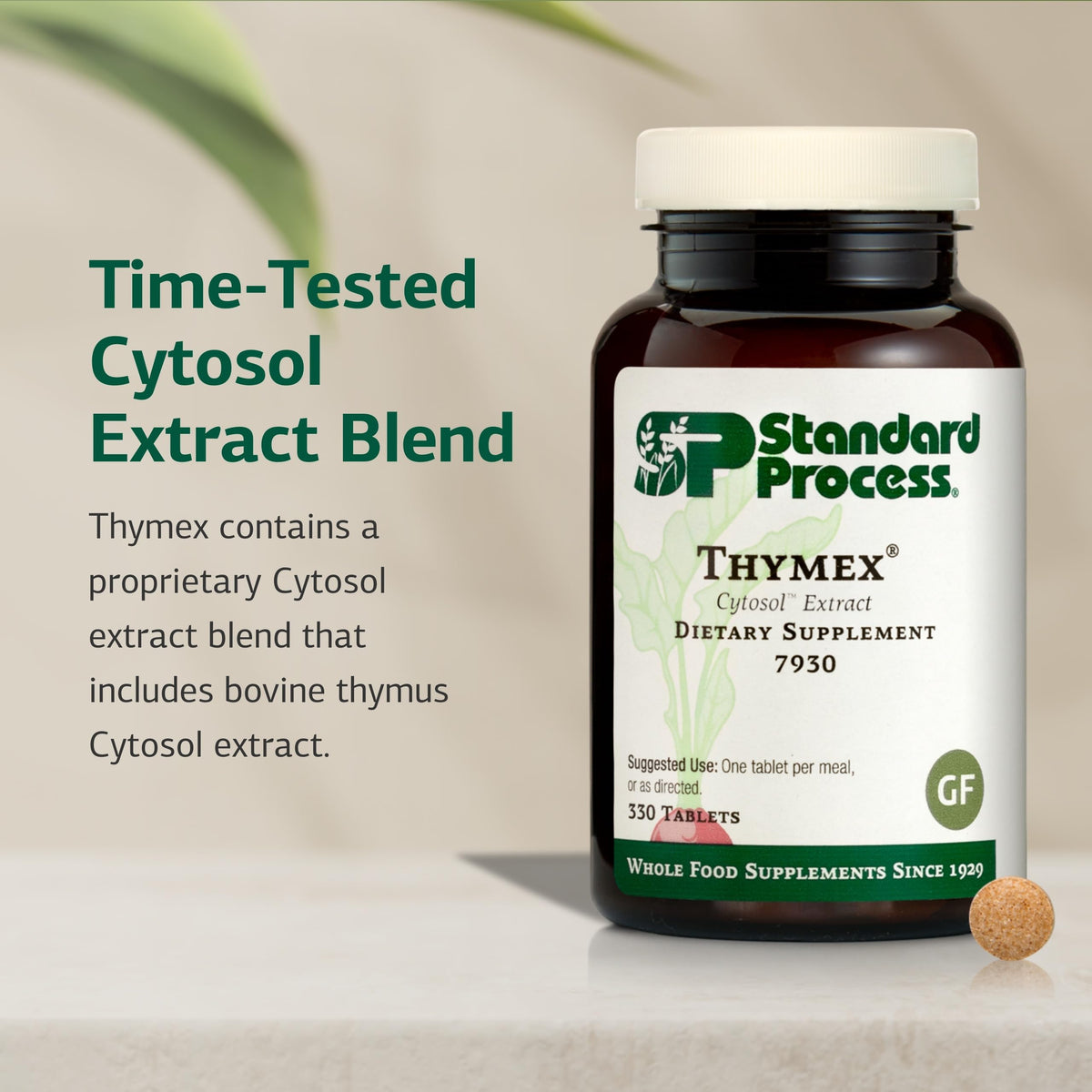 Comprimés de Standard Process Thymex sur une surface blanche