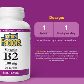 Comprimés de Vitamine B2 Natural Factors sur une surface blanche