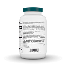 Comprimés de Wellness C-1000 de Source Naturals sur une surface blanche