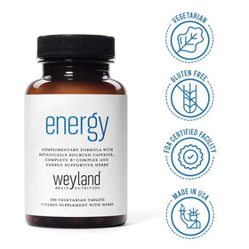Comprimés de Weyland Brain Nutrition sur une table en bois