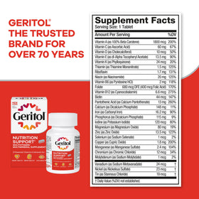 Comprimés Geritol Multivitaminé sur une table avec un verre d'eau