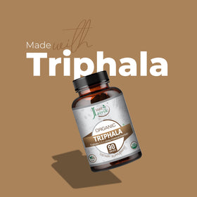 Comprimés Just Jaivik Triphala sur une surface en bois