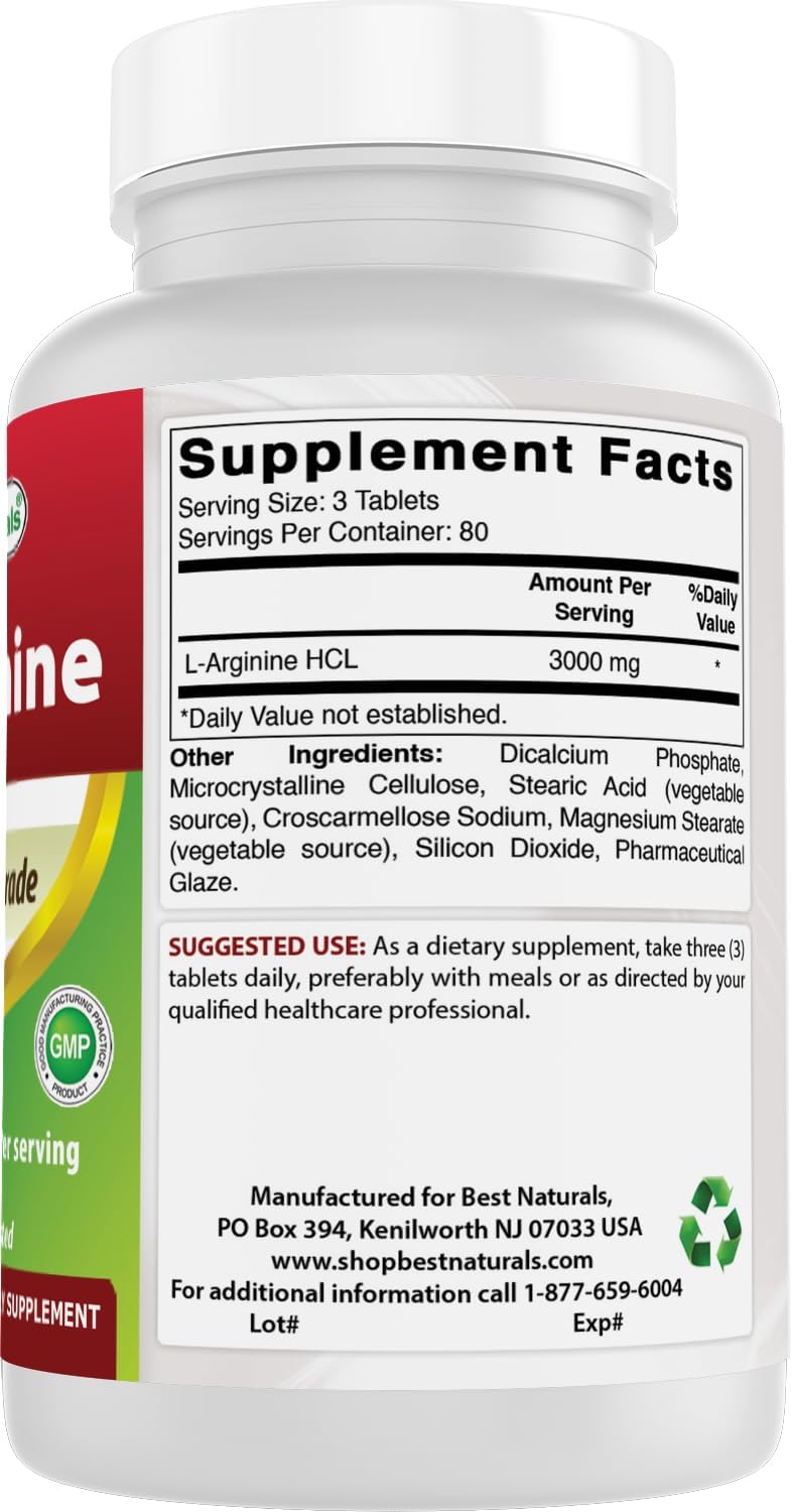 Comprimés L-Arginine sur une table avec bouteille en arrière-plan