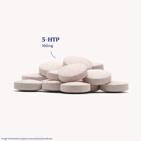 Comprimés Natrol 5-HTP sur une surface en bois