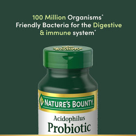 Comprimés Nature's Bounty Probiotiques Acidophilus sur une surface blanche