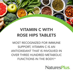 Comprimés NaturesPlus Vitamine C 1000 mg sur une table en bois
