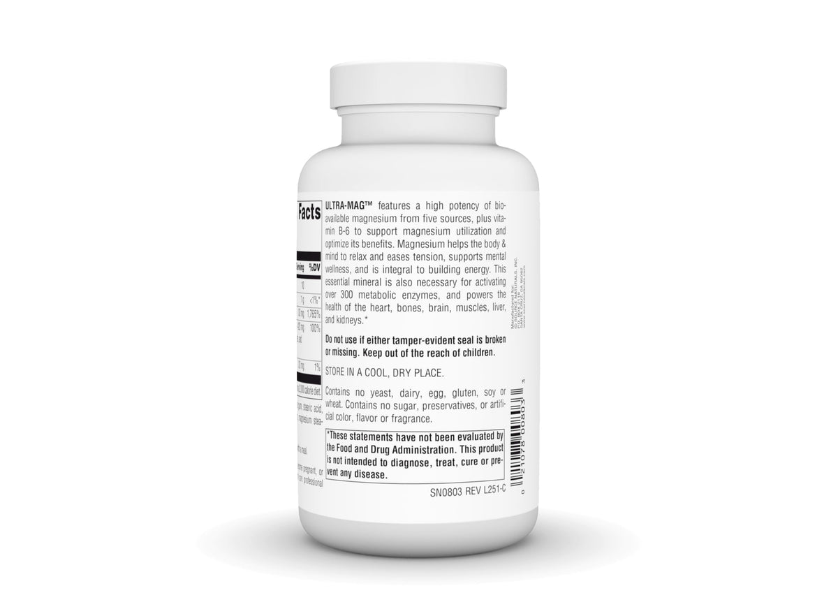 Comprimés Ultra-Mag de Source Naturals sur une surface en bois