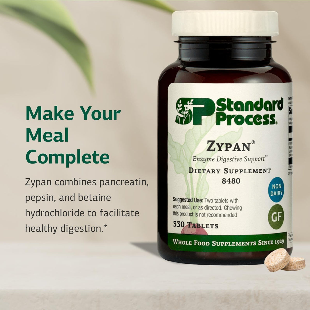 Comprimés Zypan Standard Process sur une surface blanche