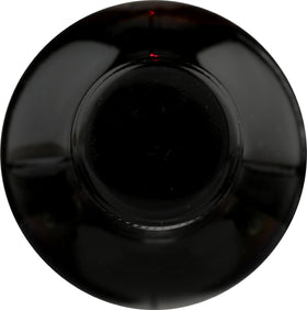 Concentré de jus de sureau Wyldewood Cellars sur une table en bois