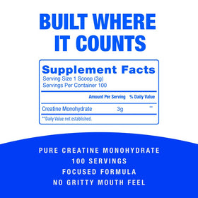 CreaBOOST Poudre de Créatine Monohydrate 399g sur une table de sport
