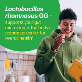 Culturelle Complément Alimentaire SlimBiotics capsules à côté d'aliments sains