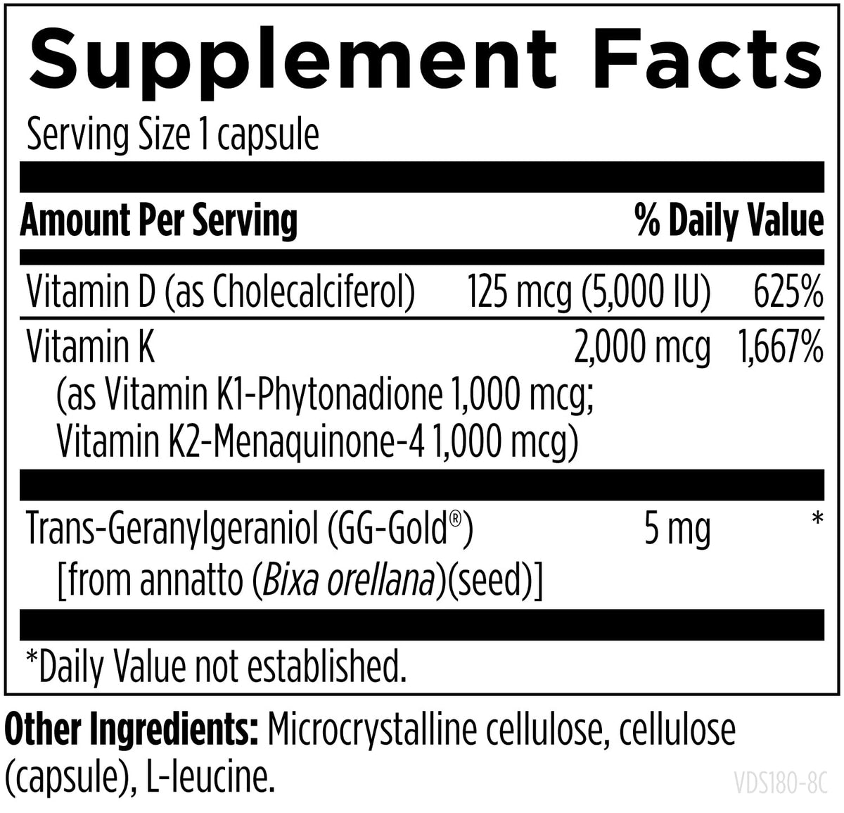 Designs for Health Vitamine D 5000 IU capsules on a table