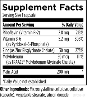 Designs for Health Zinc Bisglycinate Chelate capsules on a wooden table