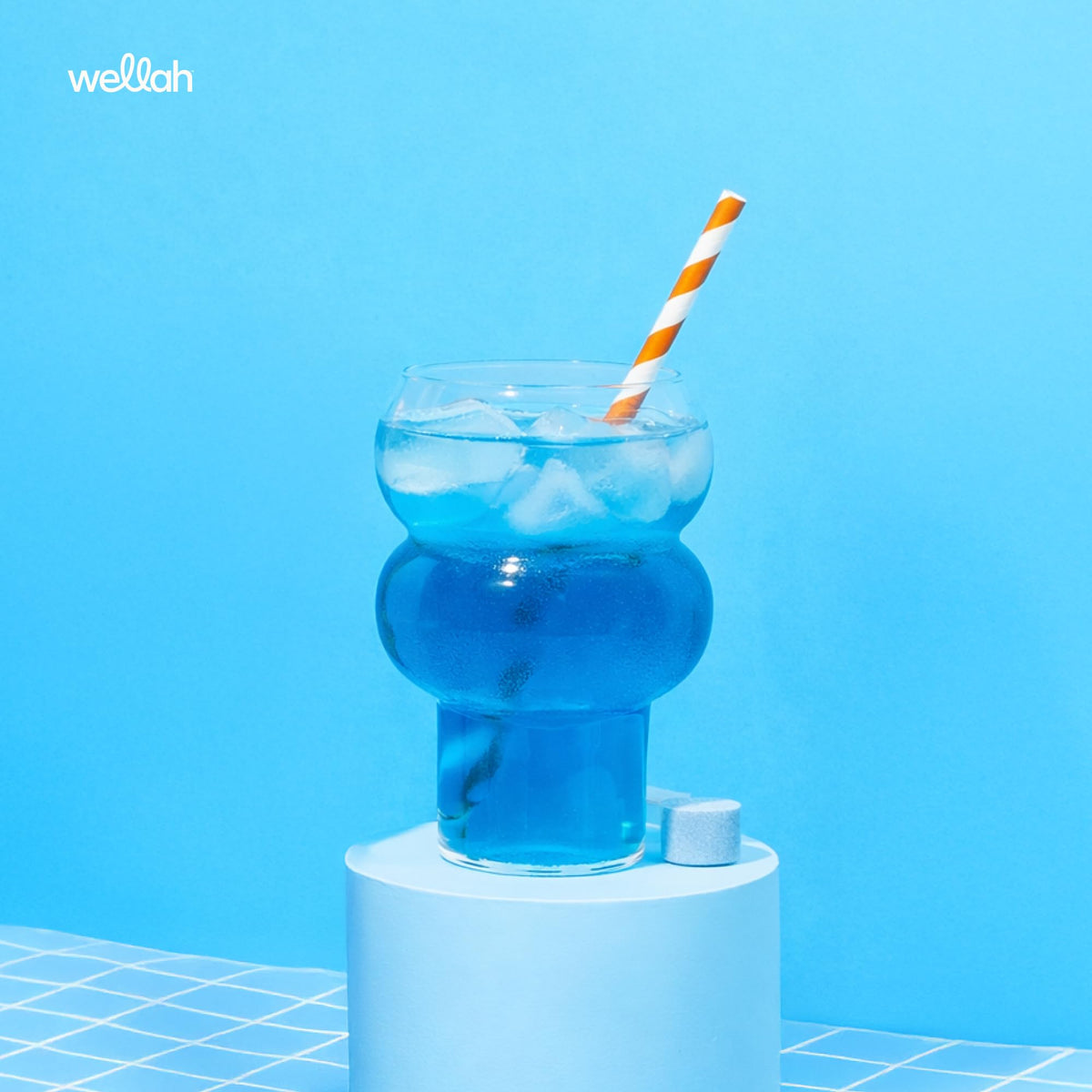 Détail de la poudre de créatine Wellah dans une cuillère