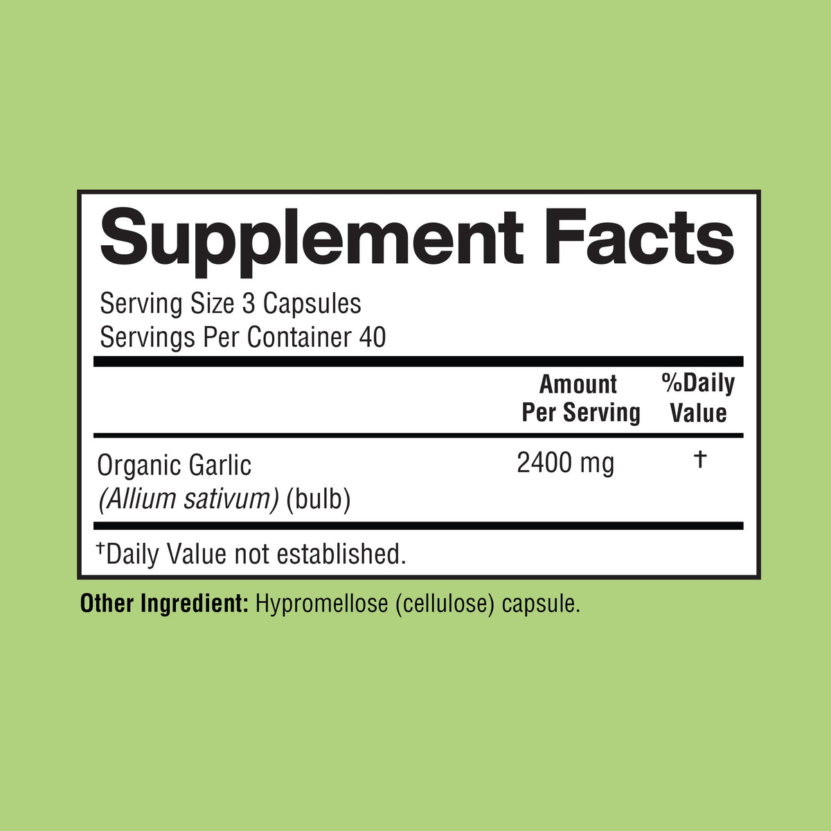 Détail des capsules d'ail Happi Mi Nutrition à côté d'une cuillère