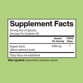 Détail des capsules d'ail Happi Mi Nutrition à côté d'une cuillère