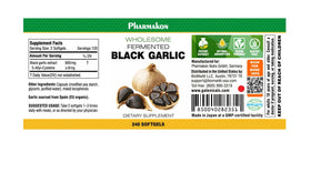 Détail des capsules d'ail noir PHARMAKON sur fond blanc