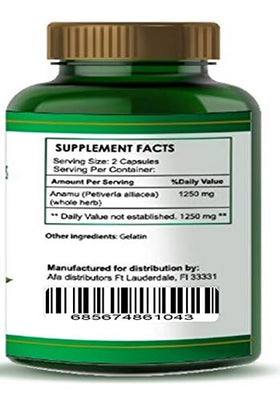 Détail des capsules d'Anamu 1250mg sur une surface en bois