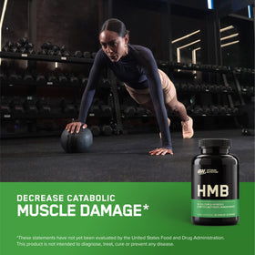 Détail des capsules HMB Optimum Nutrition sur une cuillère