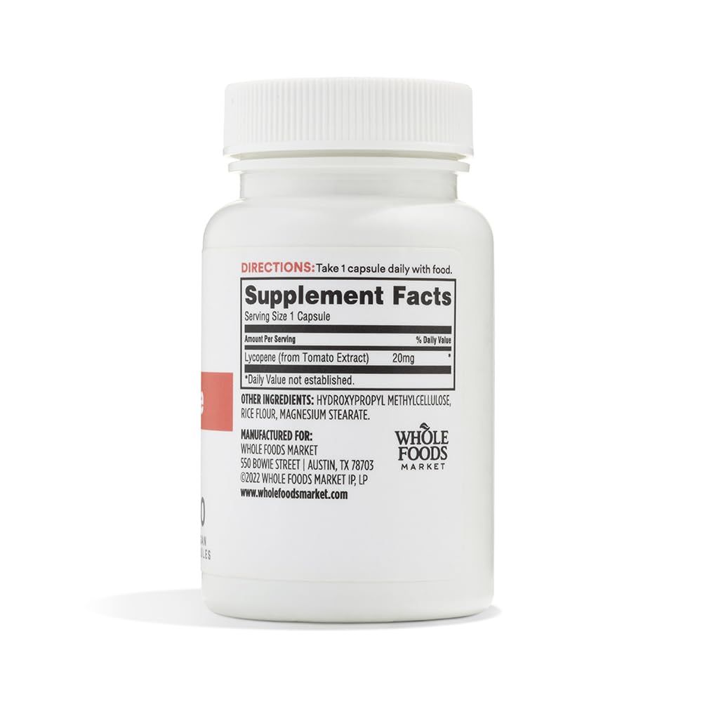 Détail des capsules végétales de lycopène 20 mg sur un fond neutre