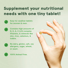 DEVA Multivitamines Vegan 90 Tablettes avec une main tenant le flacon