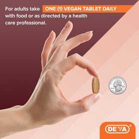 DEVA Vitamine C 500mg Vegan comprimés dans une main