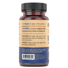 DEVA Vitamine E 400UI capsules ouvertes sur une table