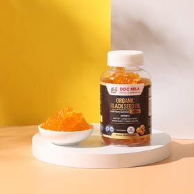 Doc Mila Gummies huile de nigelle 1500mg avec arrière-plan naturel