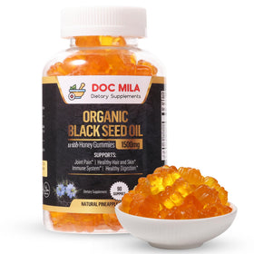 Doc Mila Gummies huile de nigelle 1500mg en gros plan sur une main