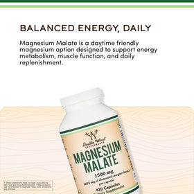 Double Wood Magnésium Malate 1 500 mg capsules à proximité d'un verre d'eau