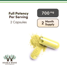 Double Wood Supplements Berberine Ceylon Cinnamon capsules with a measuring spoon