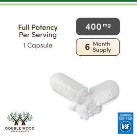 Double Wood Supplements Magnésium Glycinate 400mg 180 capsules sur une table