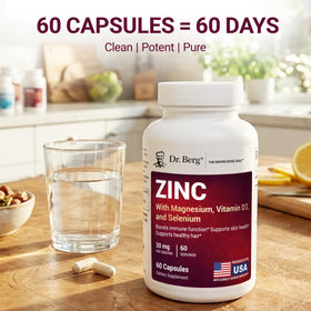 Dr. Berg Zinc 30 mg 60 capsules et un verre d'eau